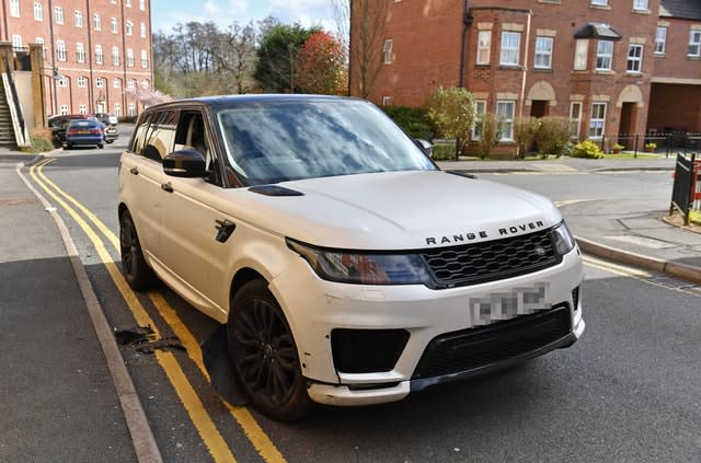 A damaged white Range Rover after reports of a crash with parked cars in the Dickens Heath area of Solihull