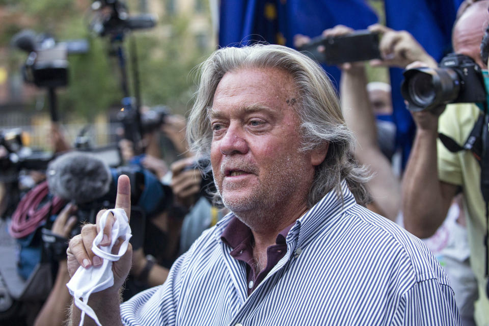 FILE - In this Aug. 20, 2020, file photo, President Donald Trump's former chief strategist, Steve Bannon, speaks with reporters in New York after pleading not guilty to charges that he ripped off donors to an online fundraising scheme to build a southern border wall. Trump is expected to pardon Bannon, Wednesday, Jan. 20, 2021, as part of a flurry of last-minute clemency action that appears to be still in flux in the last hours of his presidency. (AP Photo/Eduardo Munoz Alvarez, File)