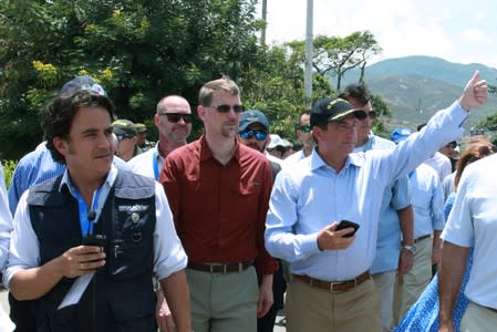 U.S. Secretary of Health and Human Services Secretary Alex Azar reacts while crossing the Simon Bolivar International Bridge in Cucuta
