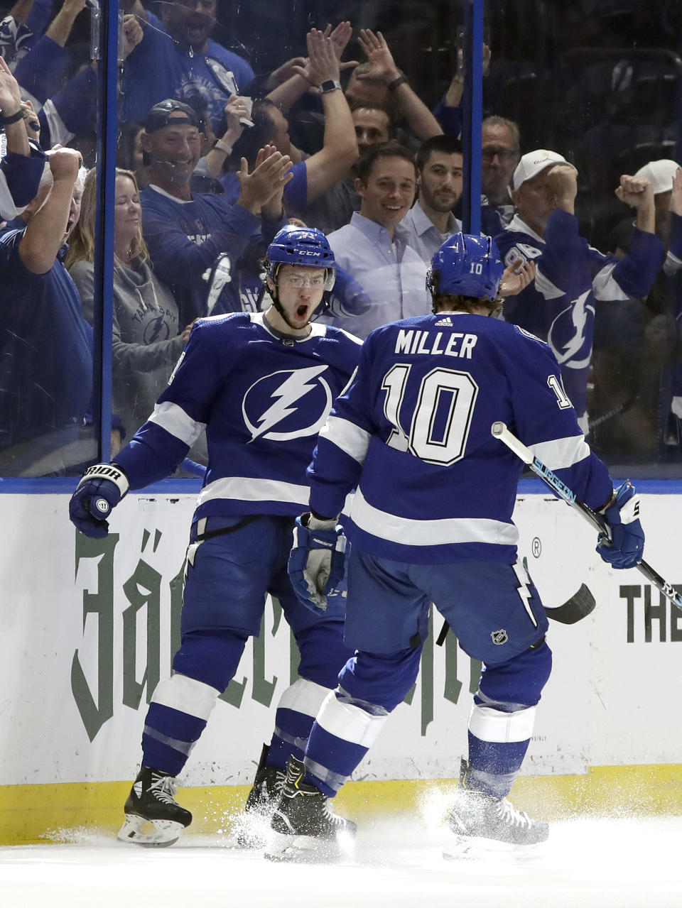 Tampa Bay Lightning center Anthony Cirelli (71) celebrates his goal against the Columbus Blue Jackets with center J.T. Miller (10) during the first period of Game 1 of an NHL Eastern Conference first-round hockey playoff series Wednesday, April 10, 2019, in Tampa, Fla. (AP Photo/Chris O'Meara)