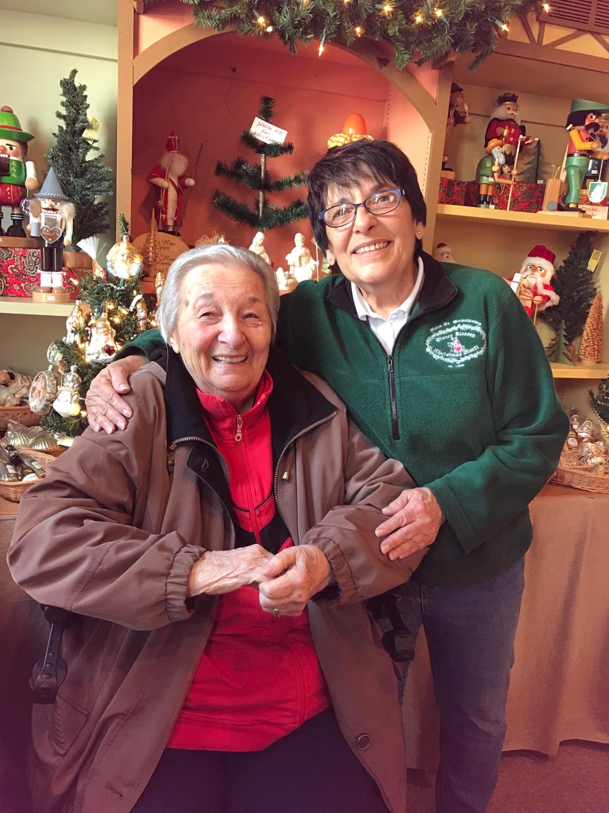 Irene Blau (left) and her daughter, Joan Morrissey celebrated 31 years at Germantown's Sinter Klausen Christmas Markt in 2019. Blau died at age 94 on Christmas Day in 2023.