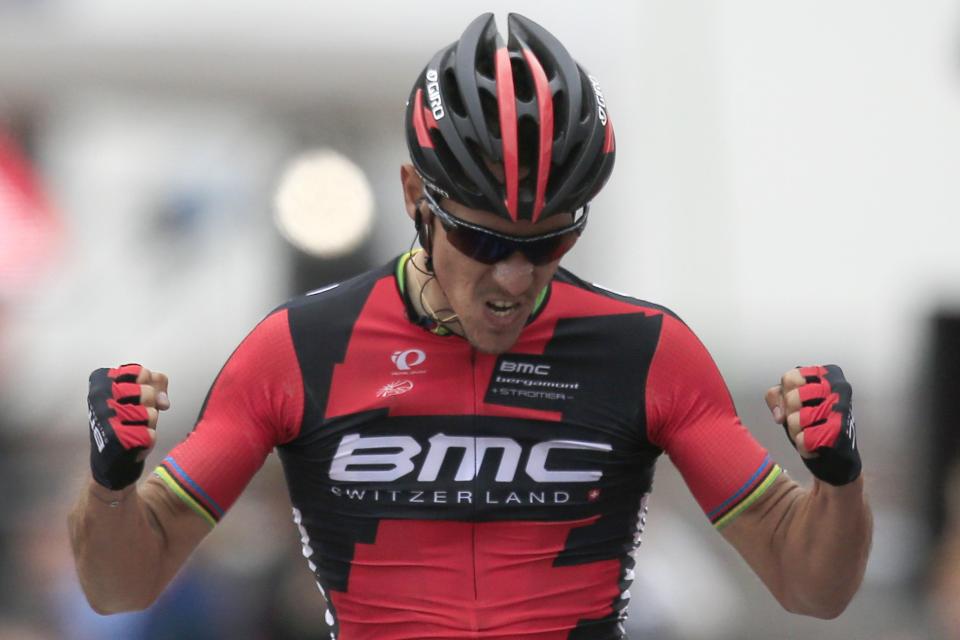 Belgium's Philippe Gilbert clenches his fists as he crosses the finish line to win the 49th edition of the Amstel Gold Cycling Race over 251.8 kilometers (156.5 miles) with start in Maastricht and finish in Valkenburg, southern Netherlands Sunday, April 20, 2014. (AP Photo/Peter Dejong)