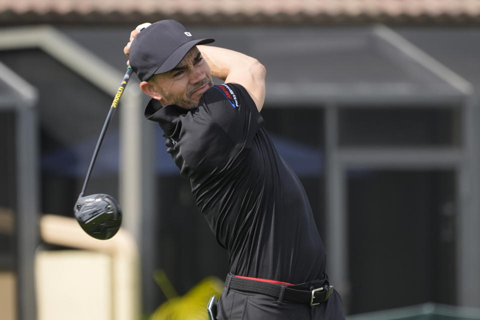 Camilo Villegas of Colombia hits from the sixth tee during the first round of the Cognizant Classic golf tournament, Thursday, Feb. 29, 2024, in Palm Beach Gardens, Fla. (AP Photo/Marta Lavandier)