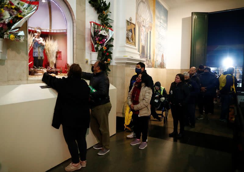 Argentine Catholics pray patron of workers, San Cayetano, the patron saint of labour and bread, during his feast day