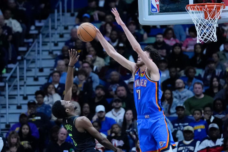 Thunder forward Chet Holmgren (7) blocks a shot by Pelicans forward Herbert Jones (5) in the second half of a 107-83 win Friday night in New Orleans.