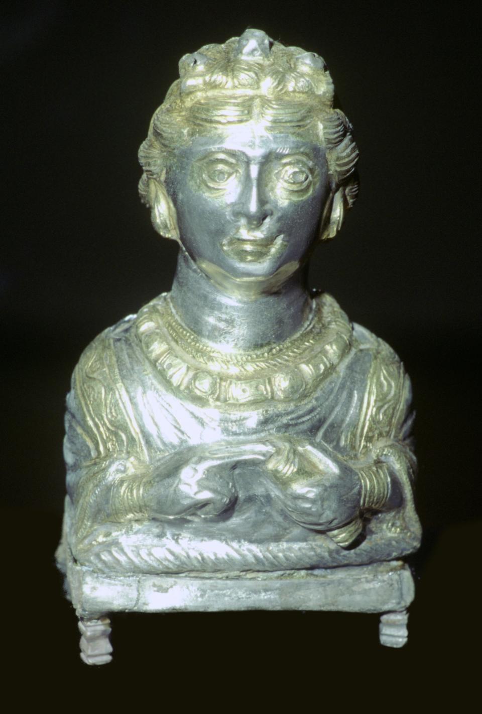 'Empress' pepper pot from the Hoxne hoard, Roman Britain, buried in the 5th century. The pepper pot is in the form of a silver bust of an Imperial lady of the late-Roman period. Found in Hoxne, Suffolk in 1992, it contained jewellery and a variety of precious tableware, buried for safety around the time of the Roman withdrawal from Britain. The Hoxne hoard is the richest find of treasure from Roman Britain. From the British Museum's collection (Photo by CM Dixon/Print Collector/Getty Images)