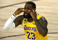 LeBron James of the Los Angeles Lakers reacts against the Oklahoma City Thunder during the second quarter during an NBA basketball game Wednesday, Aug. 5, 2020, in Lake Buena Vista, Fla. (Kevin C. Cox/Pool Photo via AP)