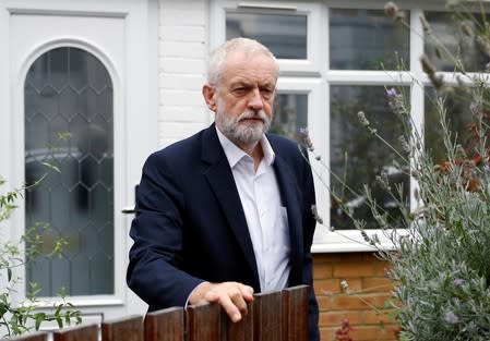 Britain's opposition Labour party leader Jeremy Corbyn leaves his home in London