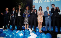 Mary English (4th L), wife of New Zealand Prime Minister Bill English and their children watch on as Bill English (not pictured) speaks during an election night event in Auckland, New Zealand, September 23, 2017. REUTERS/Nigel Marple