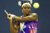 Sloane Stephens, of the United States, returns a shot to Mihaela Buzarnescu, of Romania, during the first round of the U.S. Open tennis championships, Tuesday, Sept. 1, 2020, in New York.(AP Photo/Frank Franklin II)