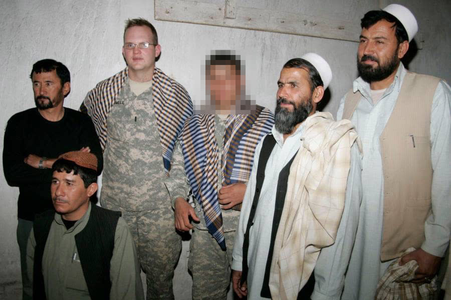 IMAGE: An Afghan interpreter stands next to former Army Capt. Jeff Trammell (Courtesy Najeeb Rahimi)