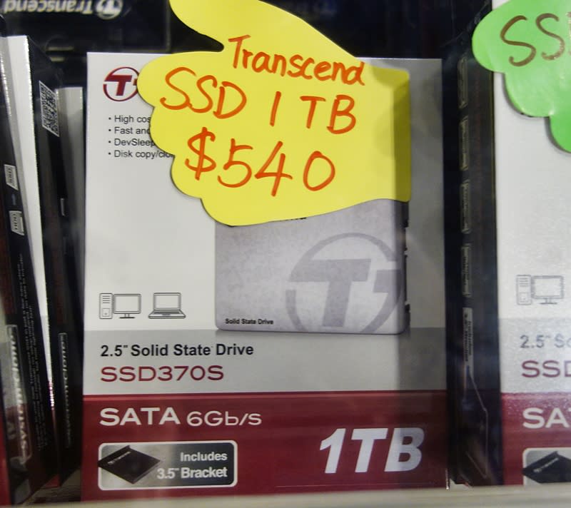 The Transcend SSD370S 1TB SSD is priced at $540, it comes with a free 1TB HDD (limited to 3 pieces per day). he drive uses an in-house controller and features synchronous MLC NAND flash memory.