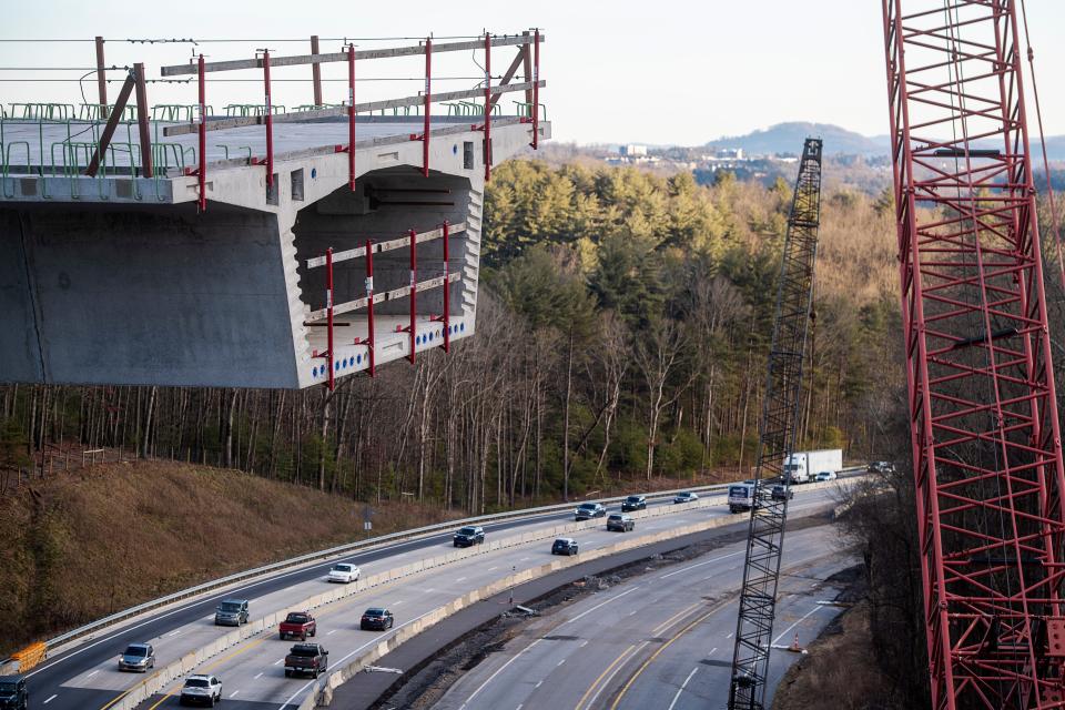 The Parkway bridge, near milepost 391.8, south of the U.S. 25/Hendersonville Rd access, uses a balanced cantilever method that is defined by having the same amount of weight on both sides of the pier, which it must have before construction can move forward.