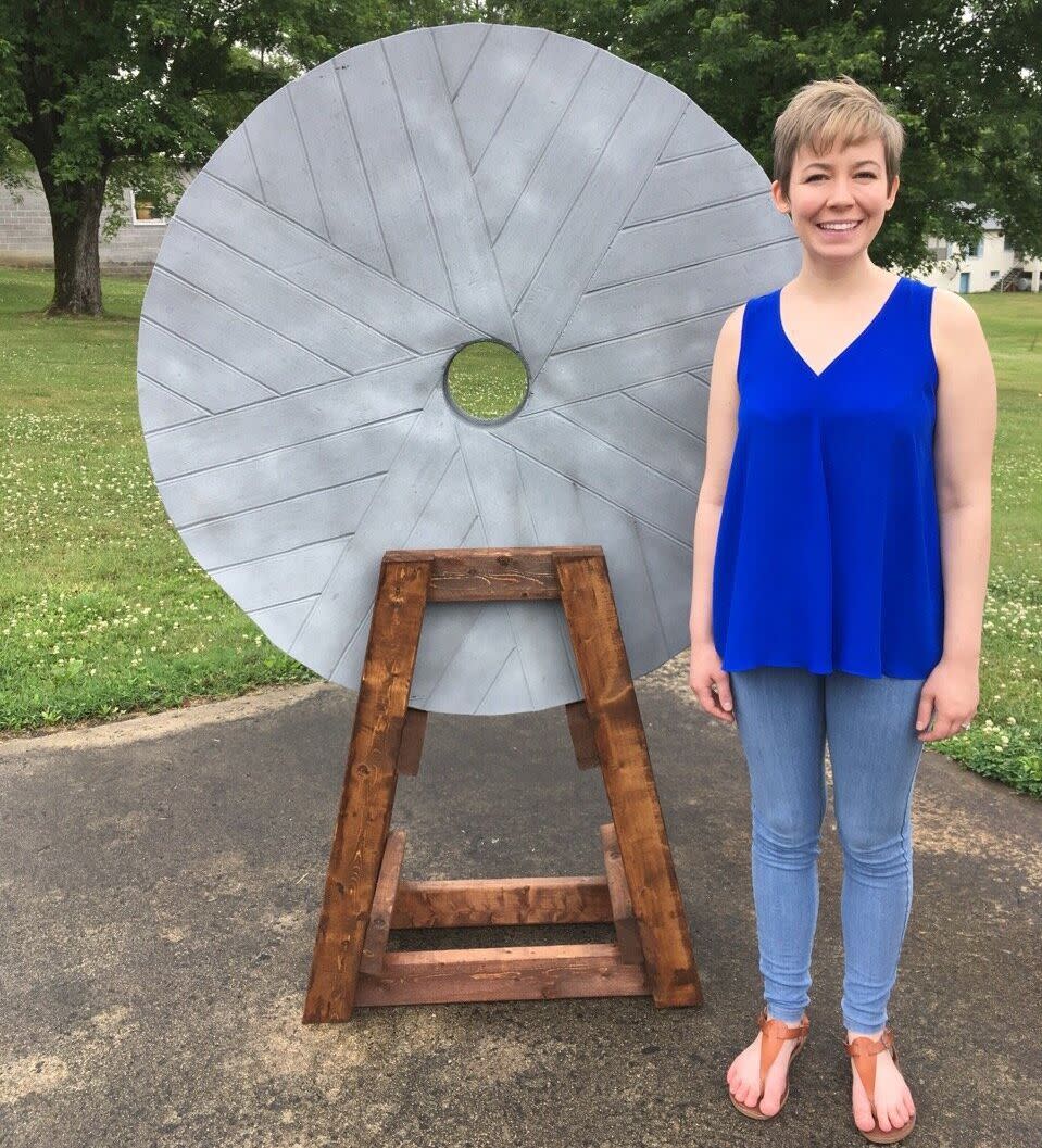 Rev. Ashley Easter stands next to a fake millstone that will be displayed Tuesday at the "For Such a Time as This" rally outside the&nbsp;Birmingham-Jefferson Convention Center in Alabama. It represents Jesus' warning about people who harm children. (Photo: For Such A Time As This Rally)