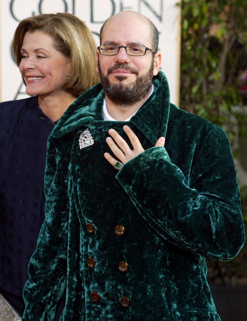 FILE - In this Jan. 25, 2004 file photo comedian David Cross and actress Jessica Walter, of the television comedy "arrested Development," arrive for the 61st Annual Golden Globe Awards in Beverly Hills, Calif. The University of Utah says a tweet from comedian Cross showing him wearing undergarments sacred to the Mormon faith was "deeply offensive." Still, President Ruth Watkins resisted online calls to cancel his upcoming performance on campus, saying in a statement Sunday, Aug. 19, 2018, the photo intended to promote the show is protected by the First Amendment. (AP Photo/Kevork Djansezian,File)