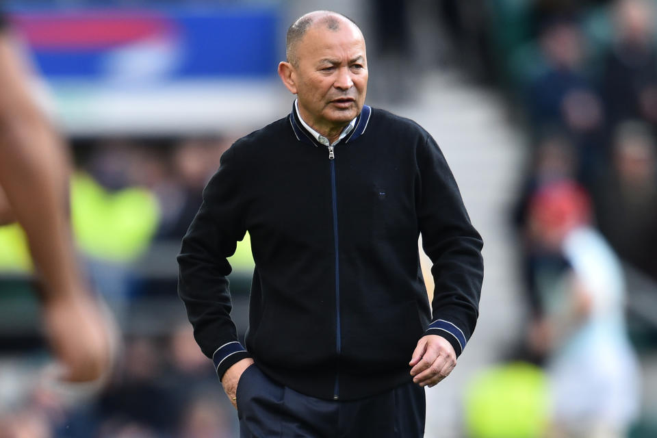 England's coach Eddie Jones watches his players warm up ahead of the Six Nations international rugby union match between England and Ireland at the Twickenham, west London, on February 23, 2020. (Photo by Glyn KIRK / AFP) (Photo by GLYN KIRK/AFP via Getty Images)