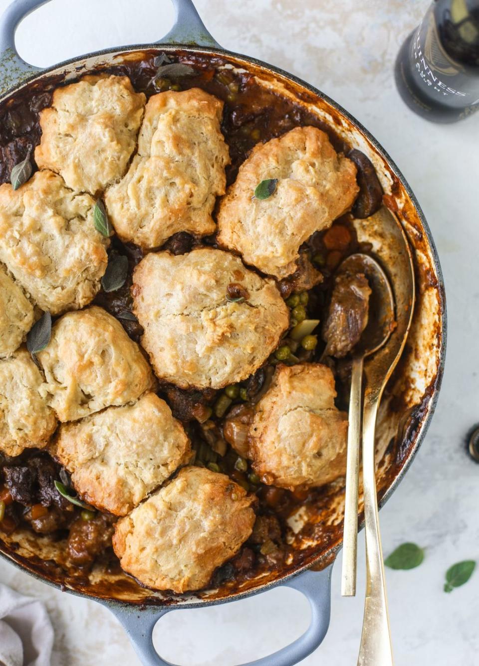 <p>Now this is the St. Patrick's Day meal everyone needs! Load up on hearty beef and buttery beer biscuits before taking part in your St. Patrick's Day festivities.</p><p><strong>Get the recipe at <a href="https://www.howsweeteats.com/2019/03/guinness-pot-pie/" rel="nofollow noopener" target="_blank" data-ylk="slk:How Sweet Eats;elm:context_link;itc:0;sec:content-canvas" class="link ">How Sweet Eats</a>.</strong> </p>