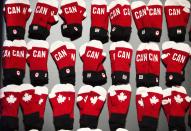 Mittens are pictured during the unveiling of the Canadian Olympic and Paralympic team clothing in Toronto, October 30, 2013. REUTERS/Mark Blinch (CANADA - Tags: SPORT OLYMPICS)