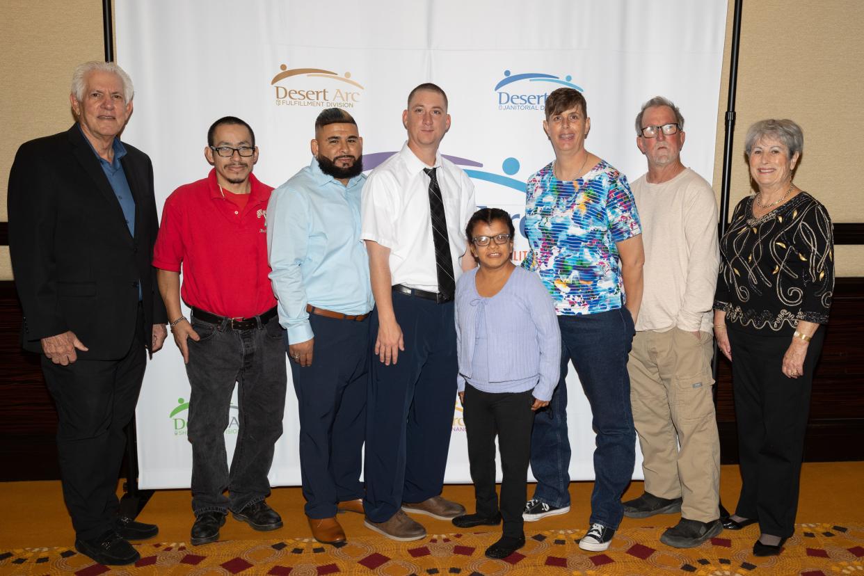 Richard Balocco, president and CEO of Desert Arc, poses with the Desert Arc Clients of the Year Luis F., Mario M., Casey W., Dulce P., Vickie C., Joey M. and luncheon chair Nancy Singer.