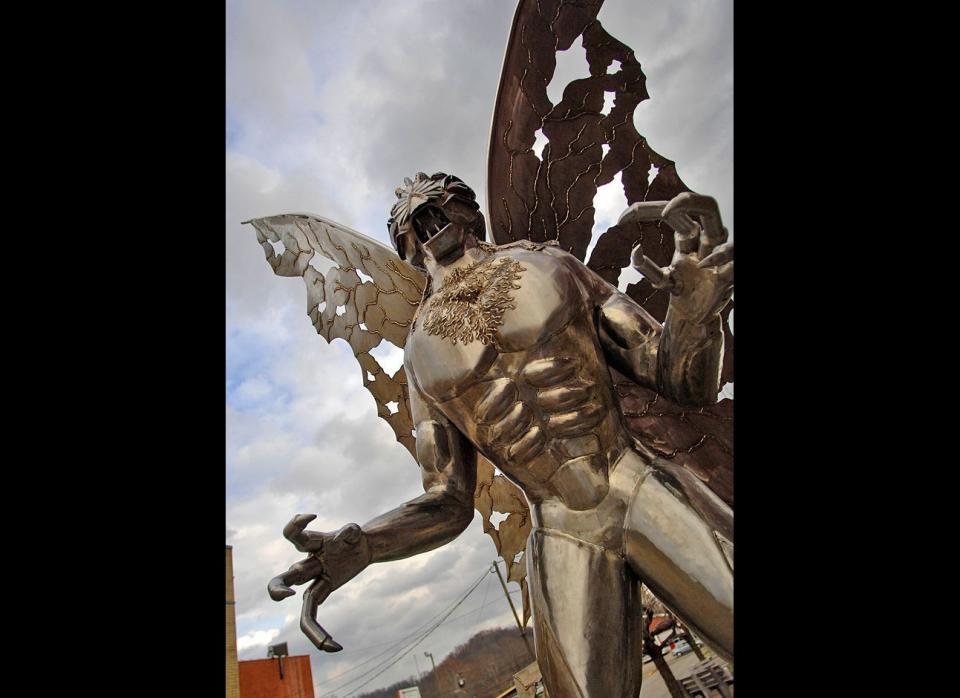 A large Mothman sculpture stands along Main Street on Dec. 11, 2007, in Point Pleasant, W.Va. More than 40 years after the first reported sighting of the mysterious creature later dubbed "Mothman," residents here have embraced his legend, helping to turn the town into a destination for people in search of an offbeat tourism experience.