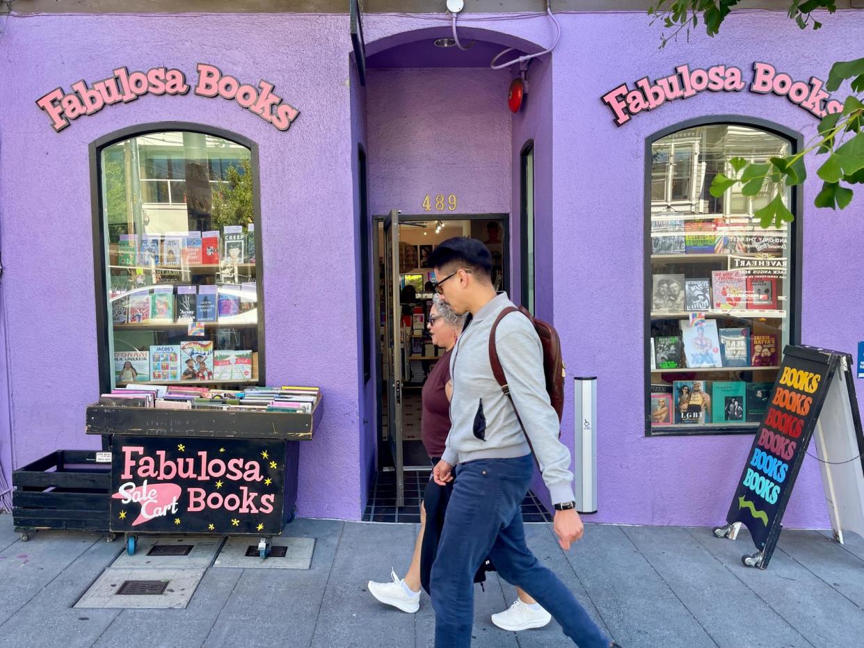 <span>Pedestrians walk past the Fabulosa Books store in San Francisco's Castro district 27 June 2024.</span><span>Photograph: Haven Daley/AP</span>