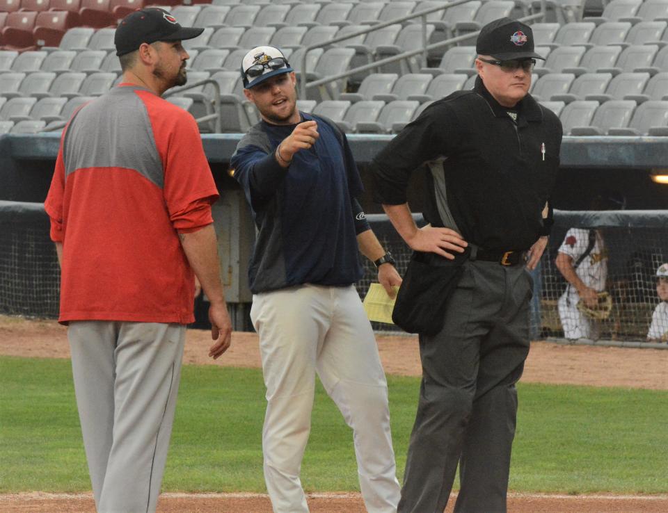 Norwich Sea Unicorns manager Kevin Murphy goes over the ground rules Wednesday night at Dodd Stadium. Looking on is Nashua Silver Knights manager Kyle Jackson and home plate umpire E. Tyler Bullock.