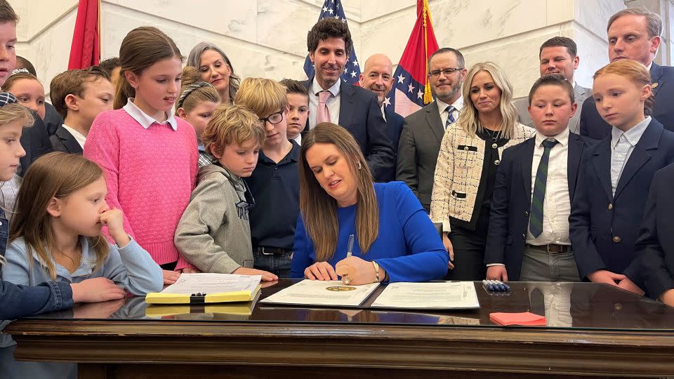 Arkansas Gov. Sarah Huckabee Sanders signs into law an education overhaul bill on Wednesday, March 8, 2023 at the state Capitol in Little Rock, Ark. (AP Photo/Andrew DeMillo) - Andrew DeMillo/AP