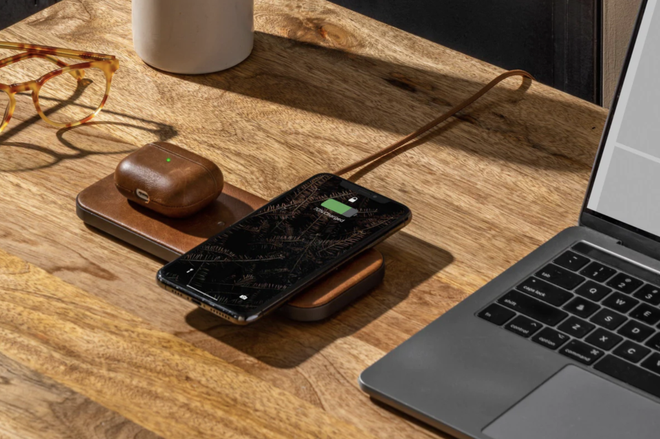 Courant Catch:2 Multi-device Wireless Charger with iphone, airpods and apple mac laptop (photo via Courant)