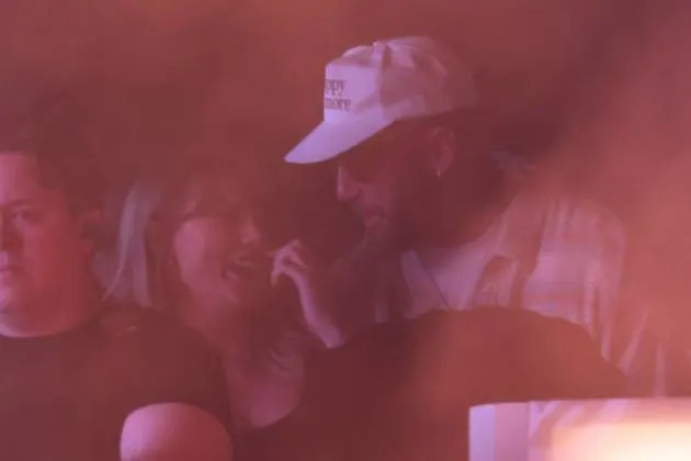 Taylor Swift and Travis Kelce watch Bleachers perform at Coachella on Saturday, April 13, 2024 - Credit: Christina House / Los Angeles Times via Getty Images