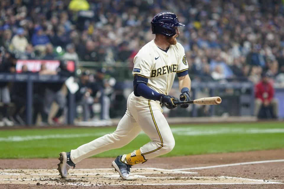 Milwaukee Brewers' Oliver Dunn hits a single during the second inning of a baseball game against the Minnesota Twins Tuesday, April 2, 2024, in Milwaukee. (AP Photo/Morry Gash)