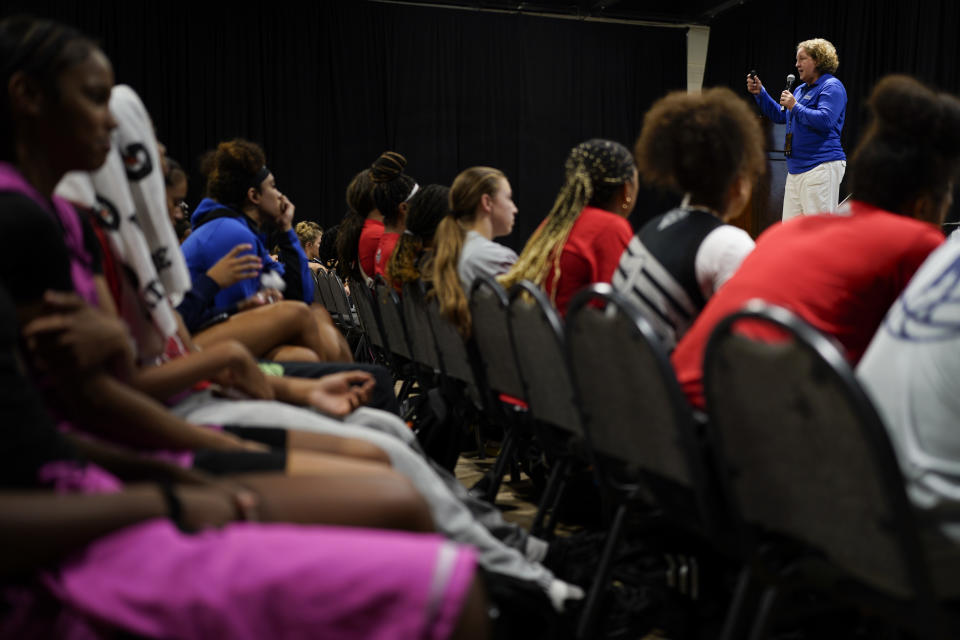 NCAA Director of Governance Susan Peal, top right, gives a Life Skills seminar on National Letter of Intent to participants at the NCAA College Basketball Academy, Saturday, July 29, 2023, in Memphis, Tenn. (AP Photo/George Walker IV)