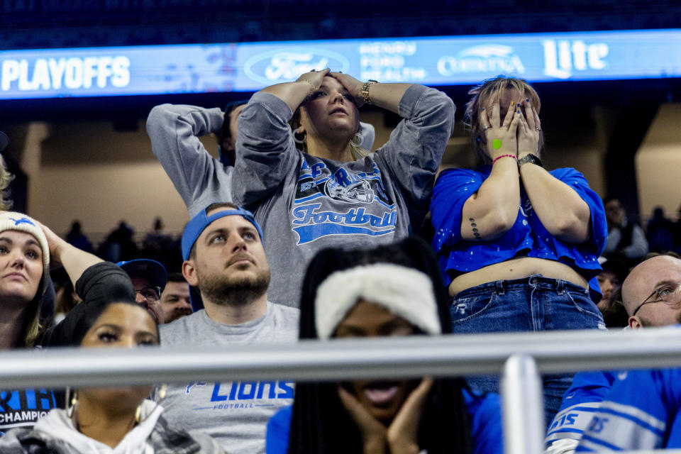 Detroit Lions fans react in the second half at Detroit's Ford Field during a watch party for the NFC Championship NFL football game against the San Francisco 49ers in Santa Clara, Calif., Sunday, Jan. 28, 2024. (Jake May/The Flint Journal via AP)