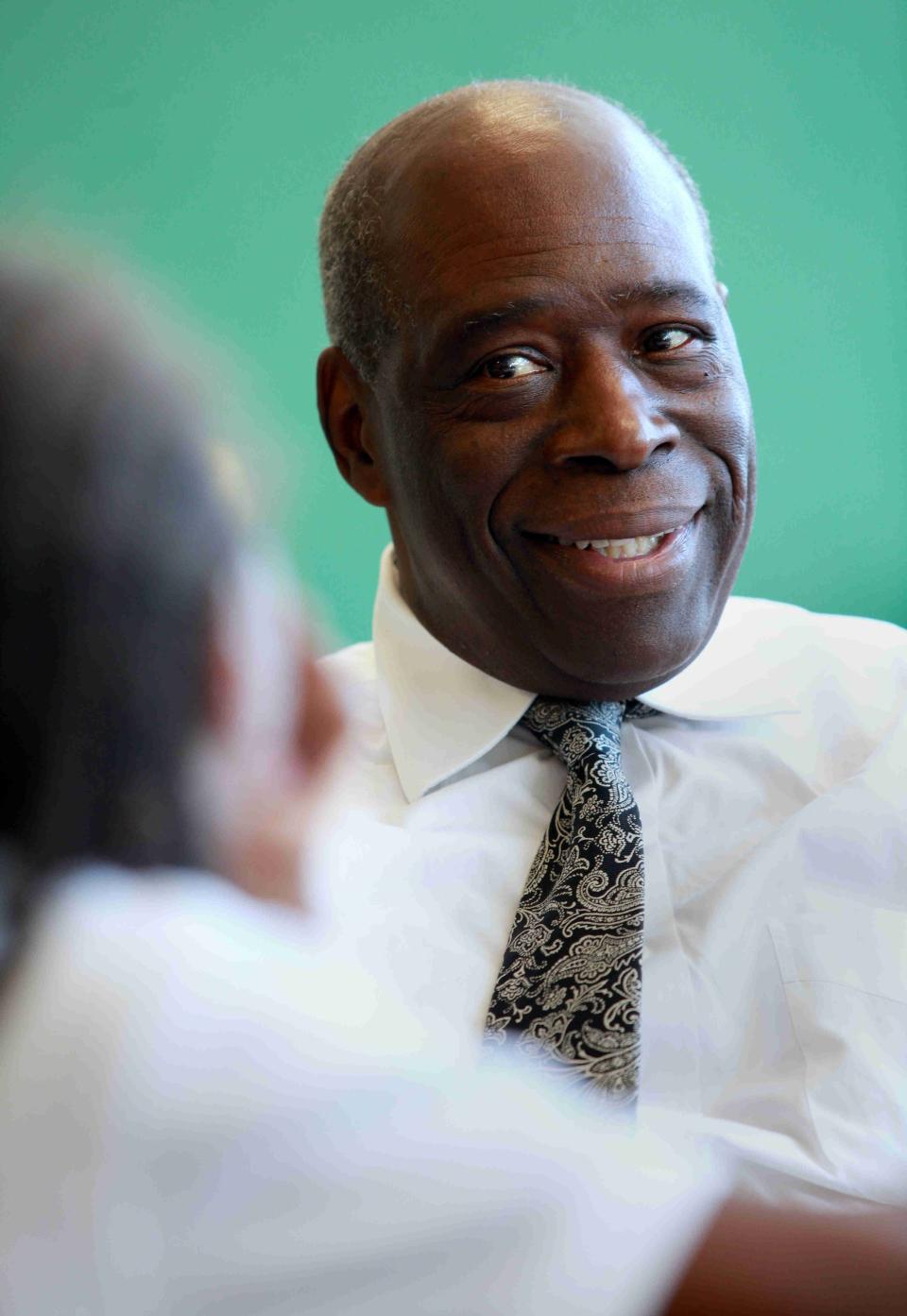 Longtime educator Maurice Pritchett, shown in this photo on Oct. 7, 2009, mentors 9-year-old Abdullah Brown, a third grader at Bancroft Elementary School, where he was principal for almost 30 years.