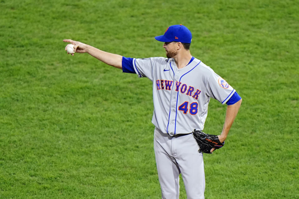 New York Mets pitcher Jacob deGrom points to the outside during the first inning of a baseball game against the Philadelphia Phillies, Wednesday, Sept. 16, 2020, in Philadelphia. (AP Photo/Matt Slocum)