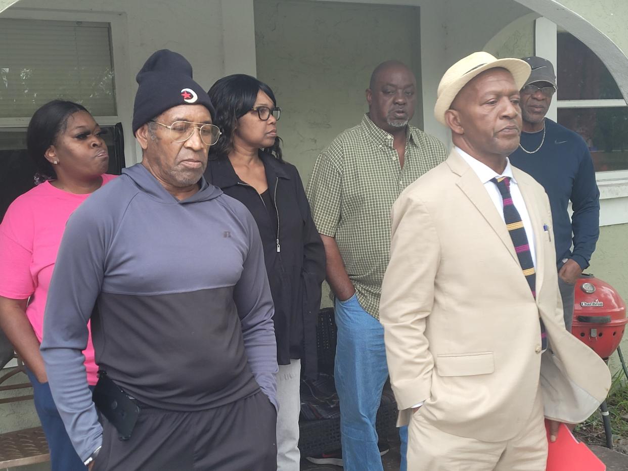 Lee County NAACP President James Muwakkil, right, and members of Christopher Jordan's family at a December 14, 2023 press conference about Jordan's shooting by a Fort Myers police officer.
