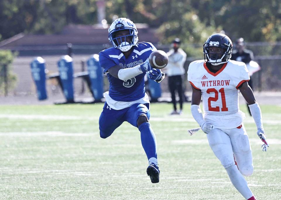 Withrow's Terhyon Nicholas, a returning all-league pick for Withrow, defends a pass in 2022.