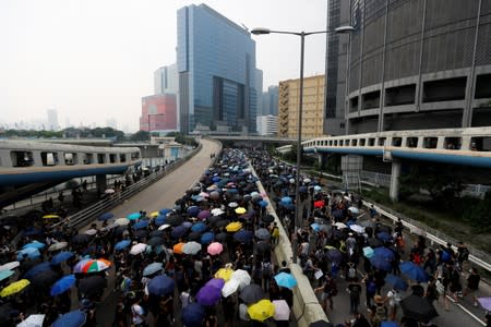 People march during a protest in Hong Kong