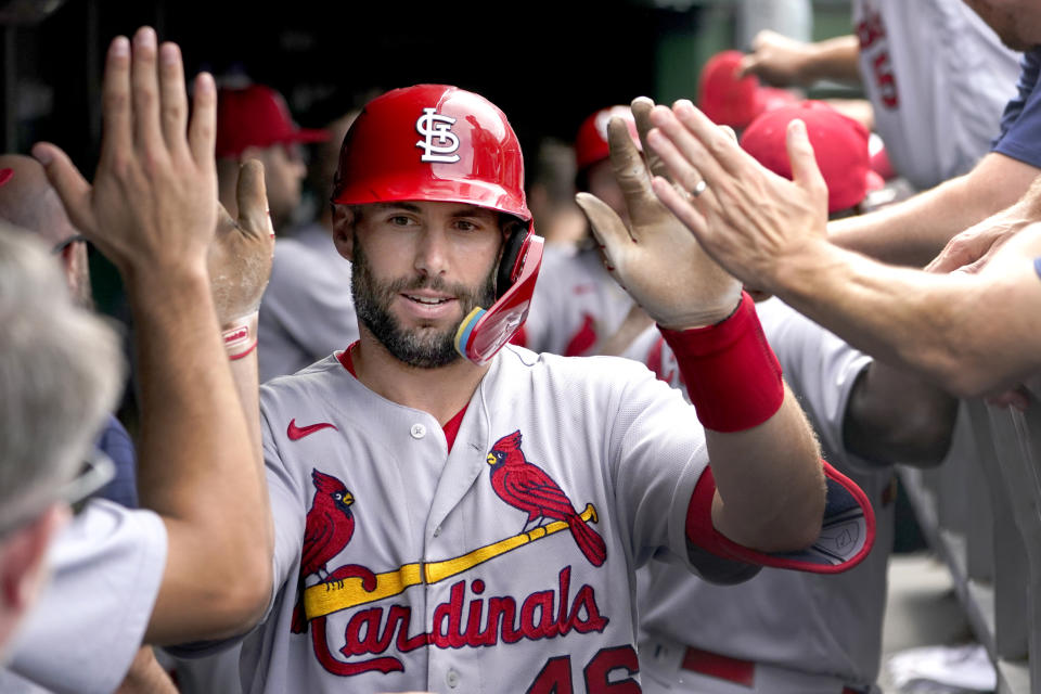 St. Louis Cardinals' Paul Goldschmidt celebrates in the dugout after his two-run homer off Chicago Cubs relief pitcher Kervin Castro during the eighth inning of a baseball game Thursday, Aug. 25, 2022, in Chicago. It was Goldschmidt's second homer of the game. (AP Photo/Charles Rex Arbogast)