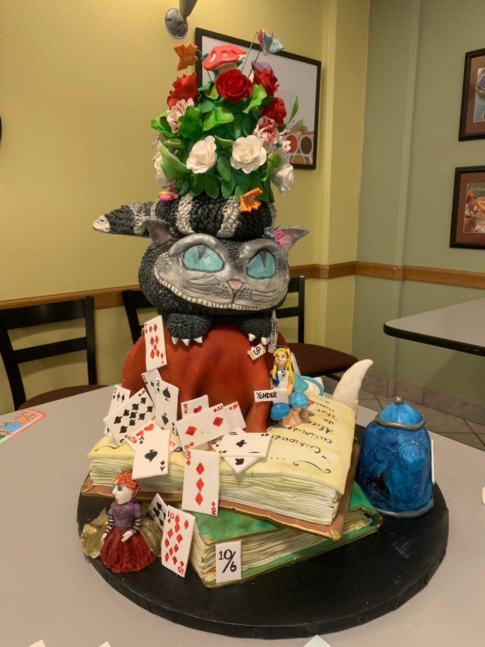 An "Alice in Wonderland" cake created by Doña Ana Community College Chefs Cecilia Castro and Jen Hart for the Edible Storybook Contest entry held April 9, 2022 at New Mexico State University.