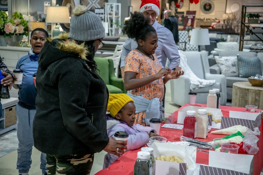 The Angel Tree Christmas Party at Talsma Furniture near Grand Rapids on Nov. 30, 2023. (Michael Buck/WOOD TV8)