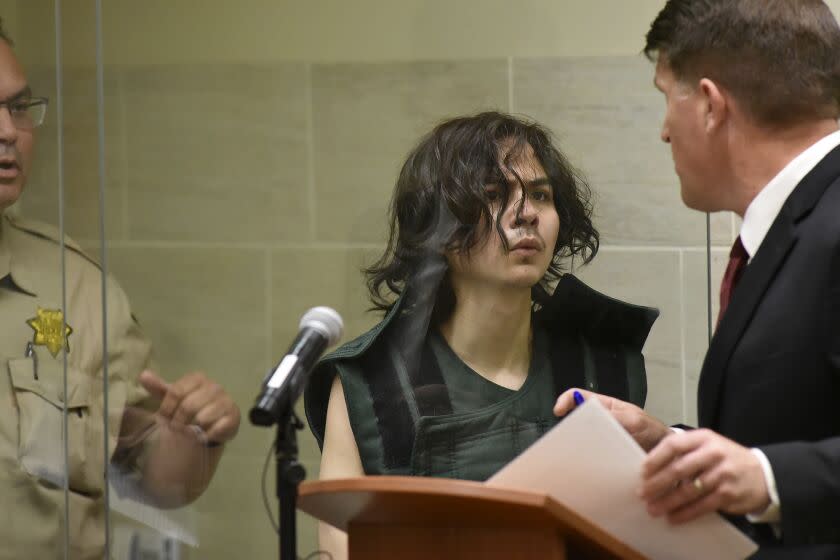 Carlos Dominguez, middle, appears during his arraignment hearing Friday at Yolo County Superior Court in Woodland.