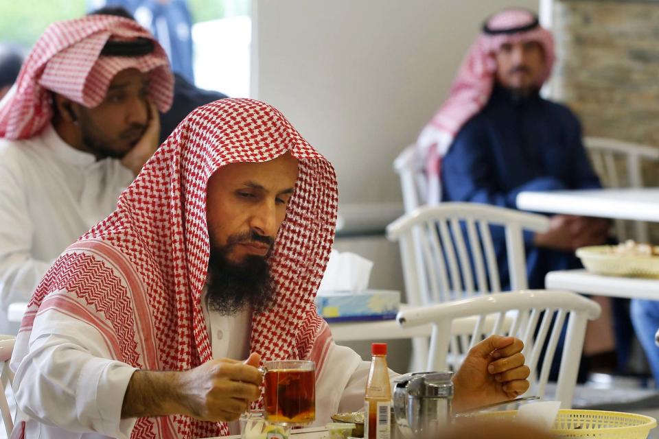 Women in Saudi Arabia will no longer need to use separate entrances from single men or sit behind partitions at restaurants and cafes in the latest measure announced by the government (AP)