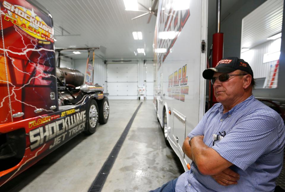 Neal Darnell talks about his jet truck Shockwave at his shop in eastern Greene County in 2015.