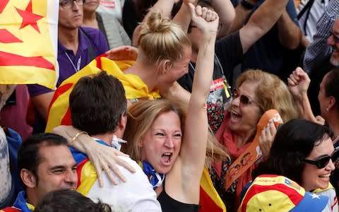 People celebrate the vote result in Barcelona - Credit: Reuters