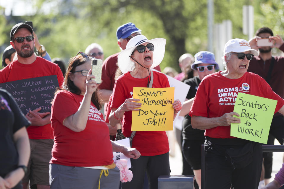 FILE - Attendees chant during a rally calling for an end to the Senate Republican walkout at the Oregon State Capitol in Salem, Ore., Thursday, May 11, 2023. The longest-ever walkout in the Oregon Legislature reached its fourth week on Wednesday, May, 31, 2023, as the enforceability of a ballot measure that would disqualify the boycotters from reelection in their next term appeared in doubt. (AP Photo/Amanda Loman,File)