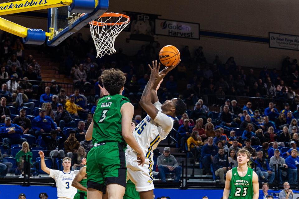 Doug Wilson of South Dakota State basketball goes up for two of his 23 points in Thursday's win over North Dakota at Frost Arena.