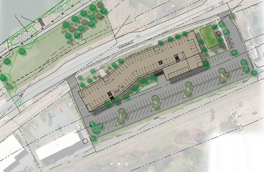 An aerial view of project plans. The lot with the building is 159 Riverside Drive and the greenspace in the top left corner shows the 144 Riverside Drive parcel.