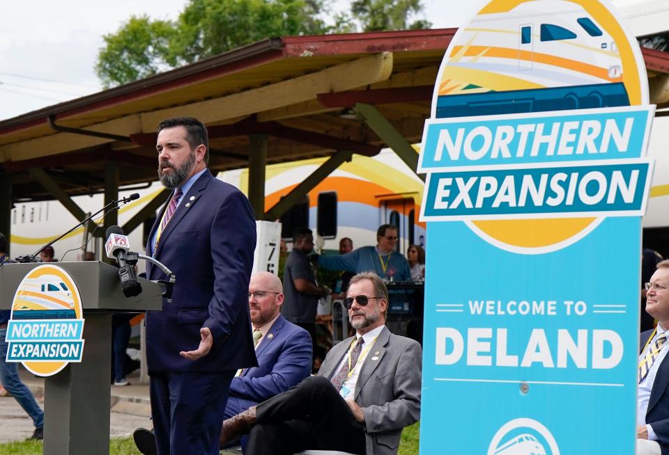 DeLand Mayor Chris Cloudman address a crowd of nearly 300 during the groundbreaking of the newest SunRail station on Monday, May 22.