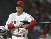 Los Angeles Angels' Shohei Ohtani reacts to a pitch in the fourth inning of the team's baseball game against the Colorado Rockies Wednesday, July 28, 2021, in Anaheim, Calif. (AP Photo/John McCoy)