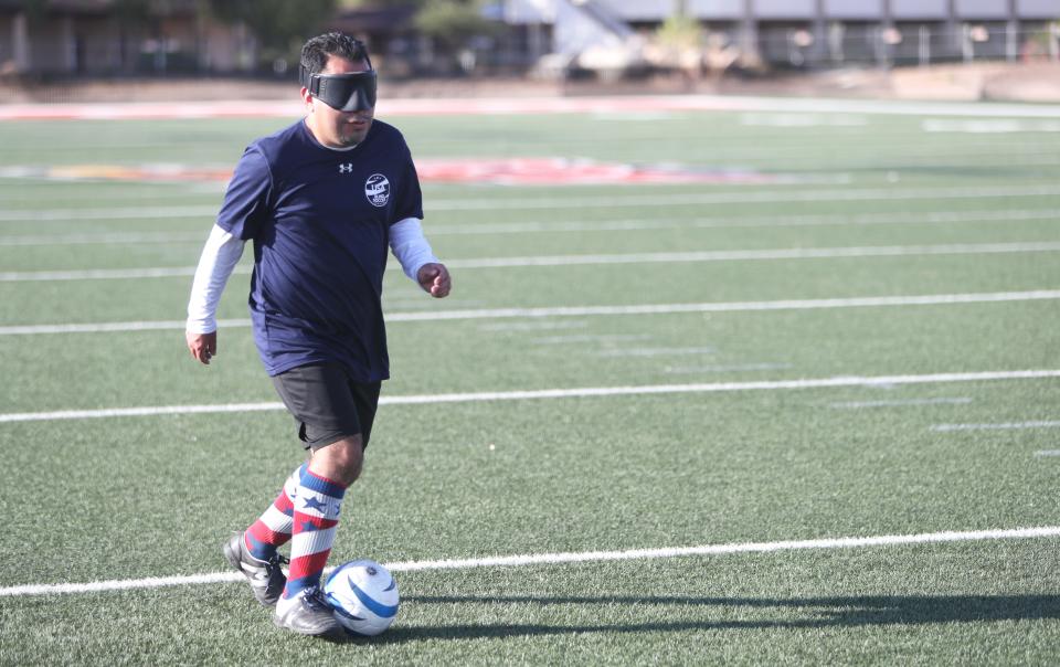 Blind soccer player Alvaro Mora Arellano practices at Arizona Christian University in Glendale on Tuesday, July 18, 2023.